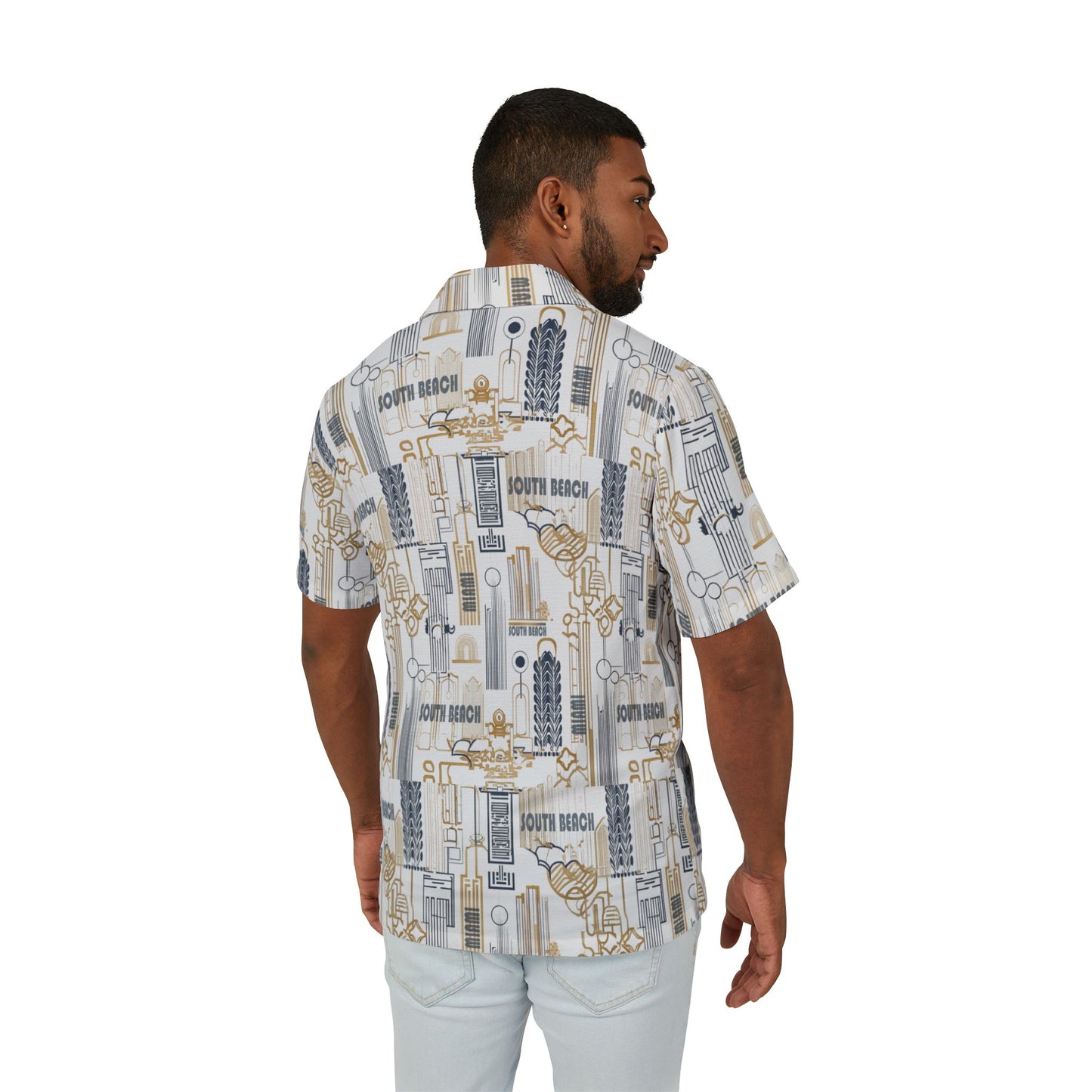 Man wearing a patterned shirt with visible branding on a white background